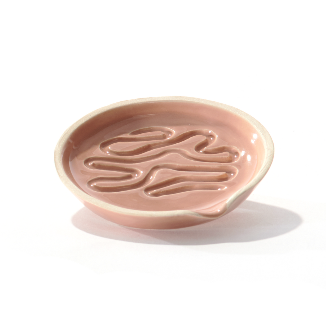 Millie in Canyon is a ceramic grinder tray that grinds weed and funnels cannabis into a pipe bowl, this smoke accessory is handmade by a woman-owned studio in the USA. Millie in beige pink  is a ceramic grinder that grinds cannabis and is a great cannabis accessory to use while enjoying your favorite bud. 