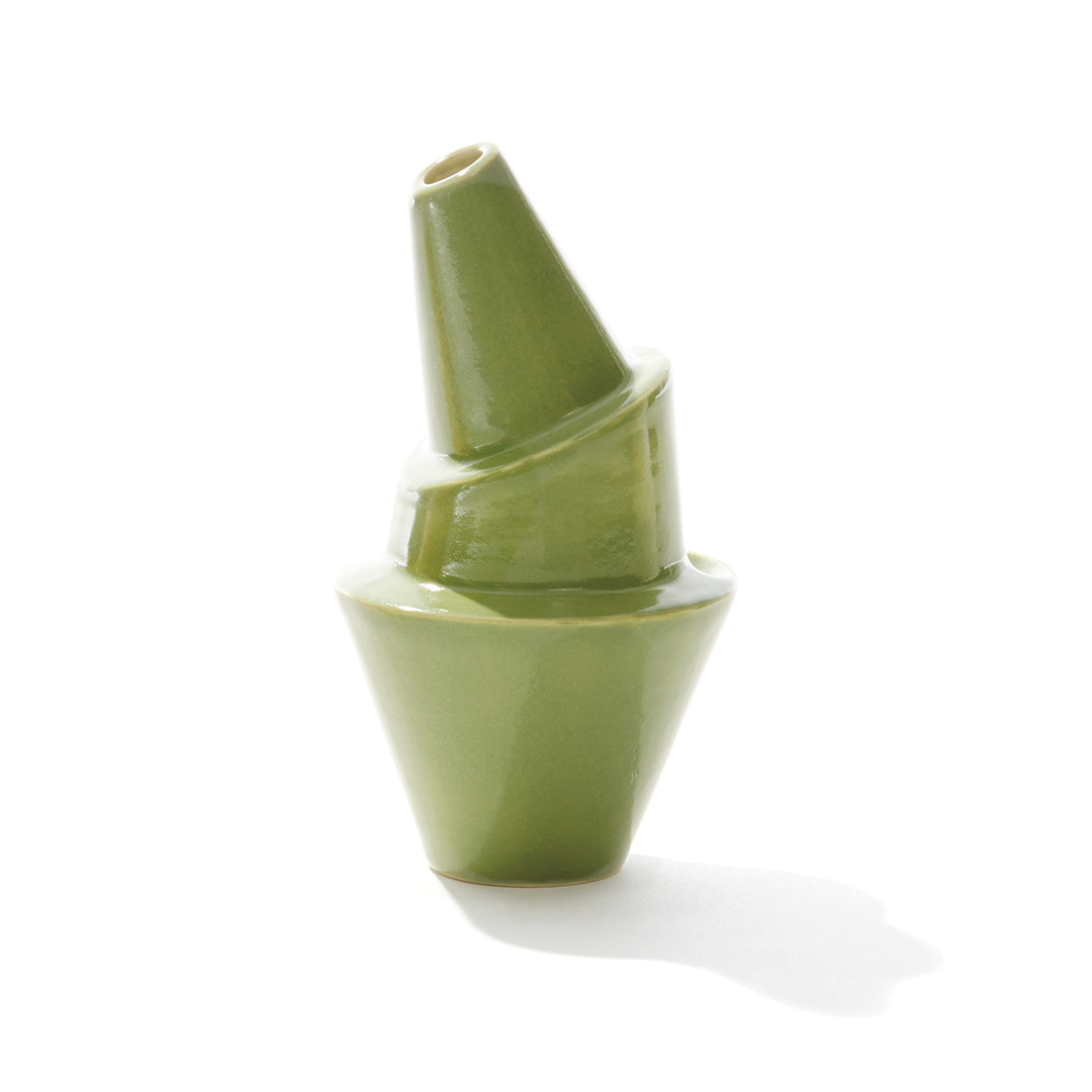 A ceramic bubbler that smokes like a dream and complements interior design; this water pipe, or mini bong, is handmade by a woman-owned studio in the United States. Billie is a green ceramic bubbler that doubles as art in your home and pairs well with your favorite smoke accessories. Smoke your favorite bud from this ceramic bong in moss.