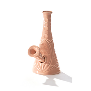  A ceramic bong that smokes like a dream and complements interior design; this water pipe is handmade by a woman-owned studio in Kansas City, MO. Flora is a pink-beige ceramic water pipe that doubles as art in your home and pairs well with your favorite smoke accessories. Smoke your favorite bud from this ceramic bong in Canyon.