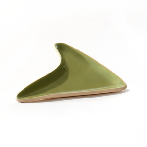 Our boomerang tray provides the perfect surface to pour out a cannabis grinder, and the built-in spout funnels weed into the pipe bowl, mess-free. Our ceramic smoke trays and accessories are handmade by a woman-owned studio in the USA. This green weed tray doubles as art in your home and complements home decor.