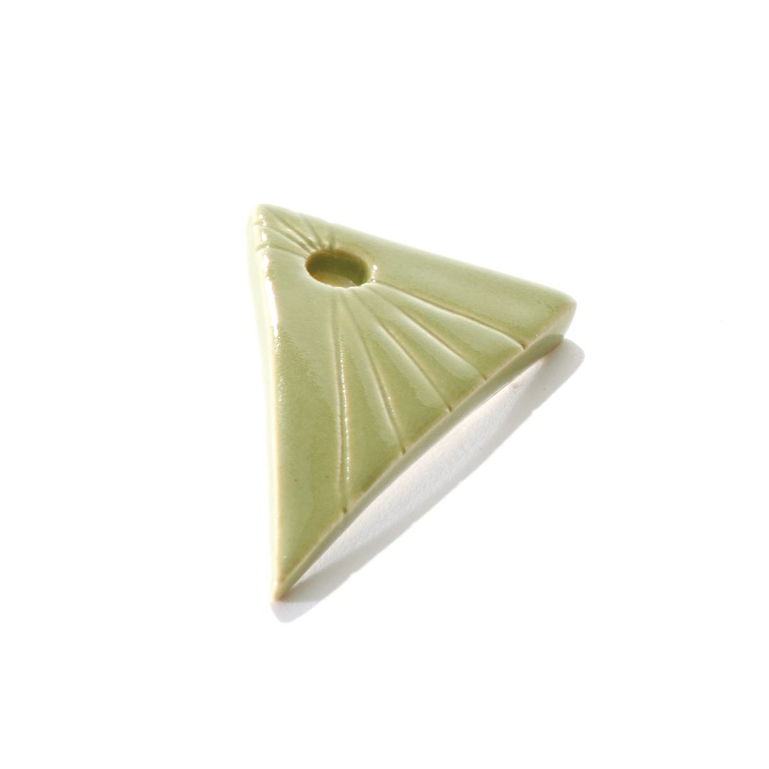 Our Triangle Jay Holder is the perfect cannabis accessory that is made to keep your fingers fresh and away from the flame. This triangle joint holder is handmade in a woman-owned studio in the USA. This hand rolled holder in green is a great cannabis weed accessory to accompany your smoke sesh of you favorite bud.
