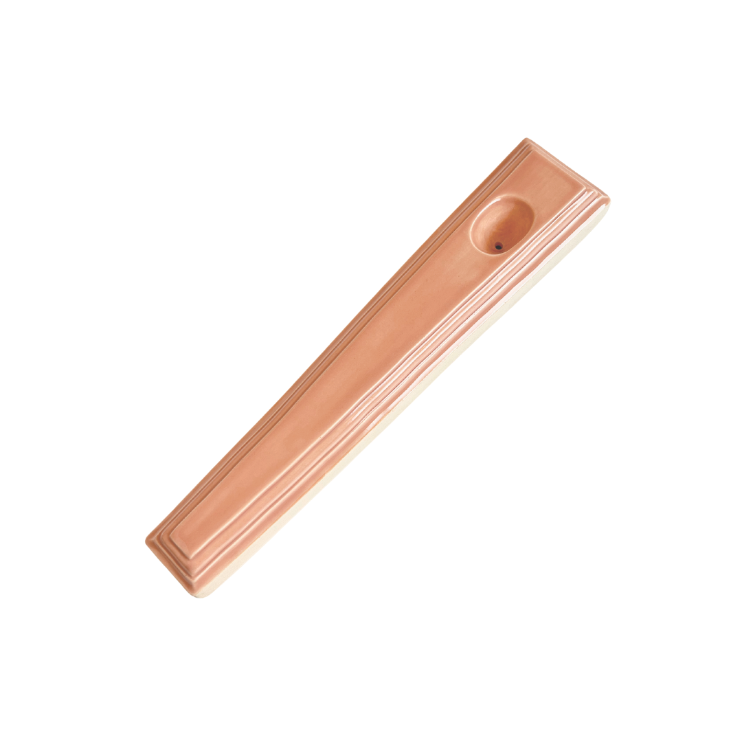 A ceramic steamroller that smokes like a dream and complements interior design; this dry pipe is handmade by a woman-owned studio in the United States. Nelle is a pink-beige ceramic pipe that doubles as art in your home and pairs well with your favorite smoke accessories. Smoke your favorite bud from this ceramic hand pipe in Canyon.