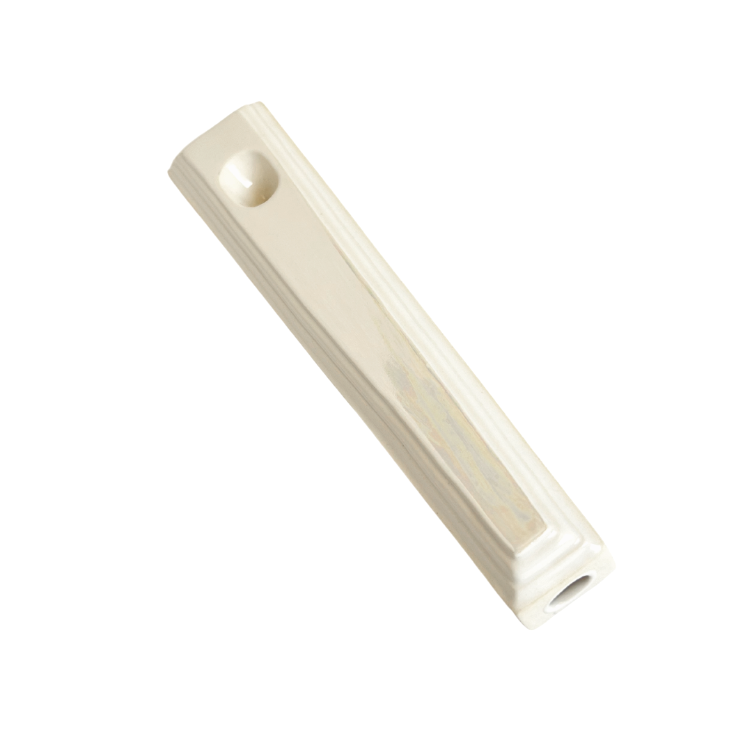 A ceramic steamroller that smokes like a dream and complements interior design; this dry pipe is handmade by a woman-owned studio in the USA. Nelle is an iridescent ceramic pipe that doubles as art in your home and pairs well with your favorite smoke accessories. Smoke your favorite bud from this ceramic hand pipe in Pearl.