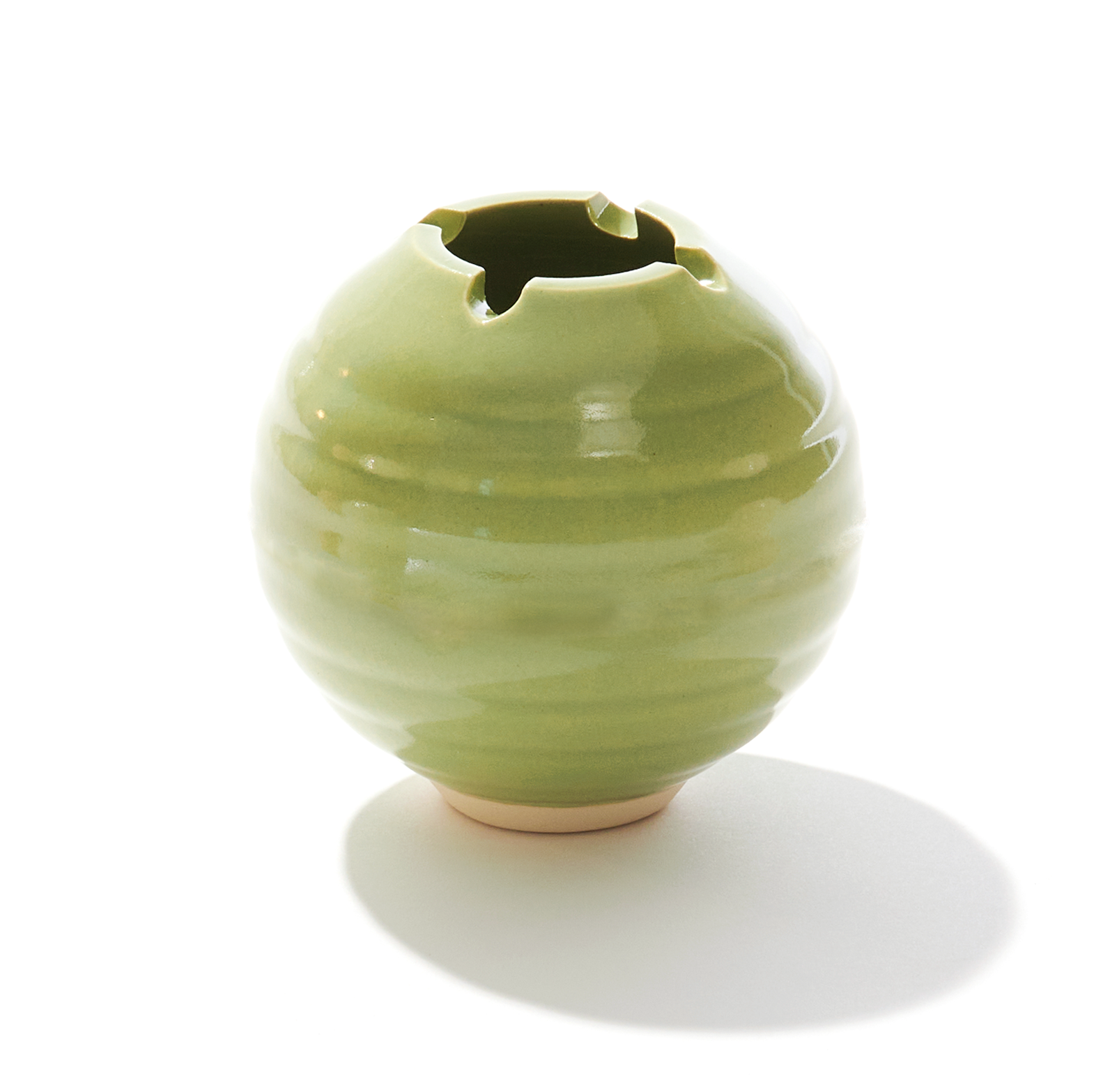 A ceramic ashtray that features a poker and a lid, this cannabis accessory is handmade by a woman-owned studio in the USA. The Orb in green comfortably fits in your hand and doubles as art in your home with a secure fit lid. The Orb ashtray is a discreet cannabis accessory to use while using your favorite bud products.