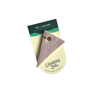 Our Triangle Jay Holder is the perfect cannabis accessory that is made to keep your fingers fresh and away from the flame. This triangle joint holder is handmade in a woman-owned studio in the USA. This hand rolled holder in green is a great cannabis weed accessory to accompany your smoke sesh of you favorite bud.