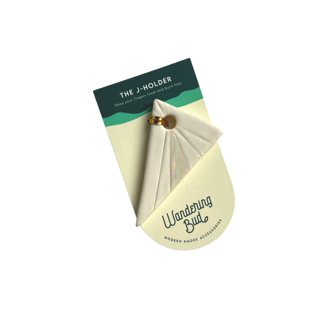 Our Triangle Jay Holder is the perfect cannabis accessory that is made to keep your fingers fresh and away from the flame. This triangle joint holder is handmade in a woman-owned studio in the USA. This hand rolled holder in pearl is a great cannabis weed accessory to accompany your smoke sesh of you favorite bud.